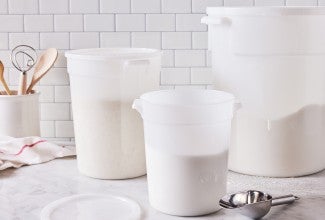 Dough buckets full of flour